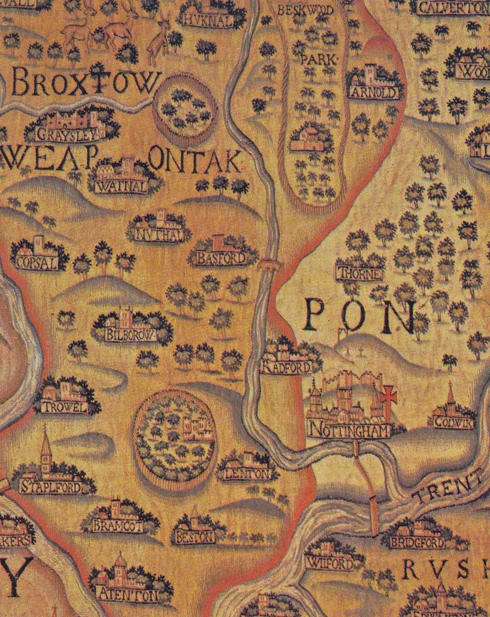 A photo of a detailed map, showing settlements, forests, rivers and bridges. The features are clear but stylised, and all features are labelled in black text.